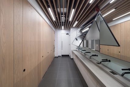 Easy access to integral paper towel dispenser unit