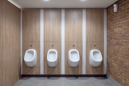Removable duct access panelling - urinals