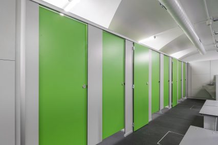 Thor toilet cubicles with bespoke door height for cleaning cupboard