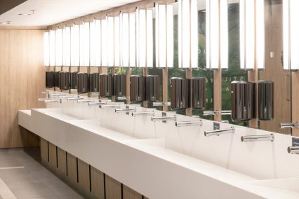 Solid surface vanity troughs